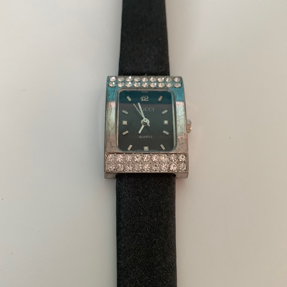 Cute black, quarts watch with sparkling band